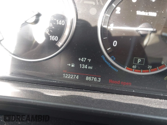 2015 BMW 5 Series 535i with VIN WBA5B1C58FG127959, listed as a IAAI auction lot 41571017 with 122,274 mi miles and . Bid and sale history available at carsss.com. Image 7.