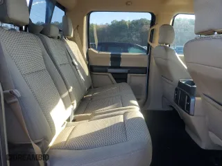 2015 Ford F-150 XLT w/HD Payload Pkg with VIN 1FTFW1EG1FKD03354, listed as a Copart auction lot 87190684 with 185,579 mi miles and Salvage Title. Bid and sale history available at carsss.com. Image 10.