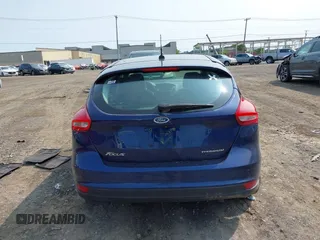 2016 Ford Focus Titanium with VIN 1FADP3N26GL206866, listed as a IAAI auction lot 42403015 with 95,753 mi miles and . Bid and sale history available at DreamBid. Image 16.