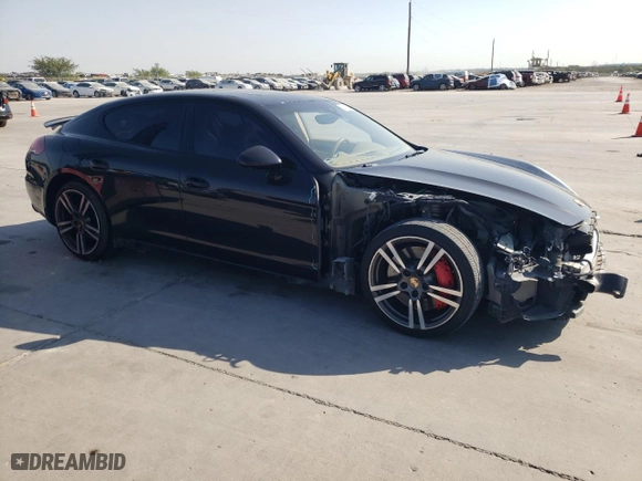 2014 Porsche Panamera GTS with VIN WP0AF2A73EL083388, listed as a Copart auction lot 74312004 with 106,386 mi miles and Salvage Title. Bid and sale history available at carsss.com. Image 4.