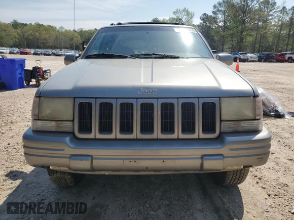 1998 Jeep Grand Cherokee Limited with VIN 1J4GZ78YXWC160346, listed as a Copart auction lot 52595655 with Not provided miles and Salvage title. Bid and sale history available at DreamBid. Image 5.