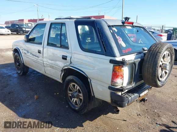 1997 Isuzu Rodeo z VIN 4S2CK58V2V4300048, wystawiony jako IAAI lot #41446738 z przebiegiem 195 609 mil mil oraz . Historia ofert i sprzedaży dostępna na DreamBid. Obrazek 3.