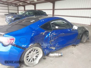 2015 Subaru BRZ Limited with VIN JF1ZCAC1XF8603918, listed as a IAAI auction lot 42296875 with 39,869 mi miles and . Bid and sale history available at DreamBid. Image 6.