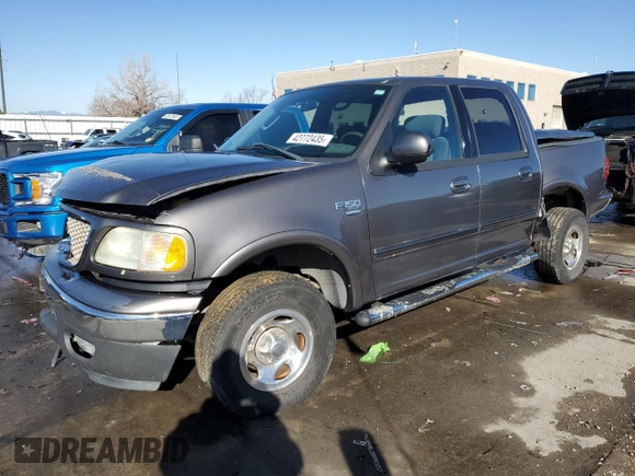 2003 Ford F-150 XLT with VIN 1FTRW08673KA38056, listed as a Copart auction lot 42772435 with 129,104 mi miles and Salvage Title. Bid and sale history available at carsss.com. Image 1.