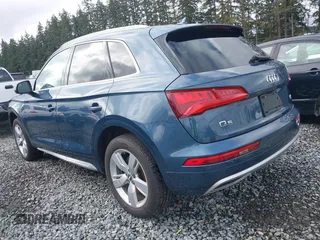 2018 Audi Q5 Premium Plus z VIN WA1BNAFY7J2010375, wystawiony jako IAAI lot #41751404 z przebiegiem 69 417 mil mil oraz . Historia ofert i sprzedaży dostępna na DreamBid. Obrazek 3.