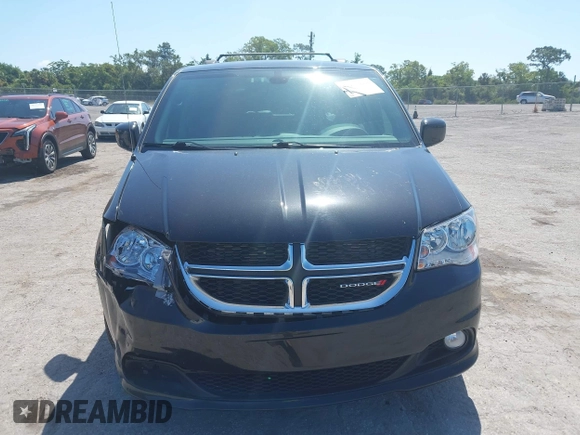 2019 Dodge Grand Caravan SXT with VIN 2C4RDGCG5KR739144, listed as a IAAI auction lot 42175888 with 43,577 mi miles and . Bid and sale history available at DreamBid. Image 12.