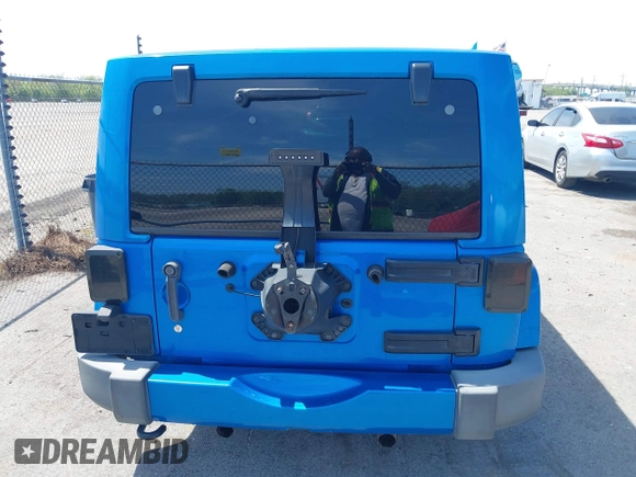 2016 Jeep Wrangler Unlimited Sahara with VIN 1C4HJWEG0GL154418, listed as a IAAI auction lot 41892333 with 102,410 mi miles and . Bid and sale history available at DreamBid. Image 16.