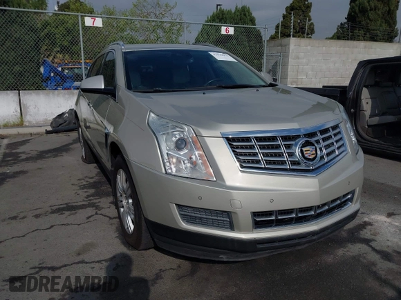 2015 Cadillac SRX Luxury Collection with VIN 3GYFNEE33FS548324, listed as a IAAI auction lot 42029979 with 70,372 mi miles. Bid and sale history available at carsss.com. Image 1.
