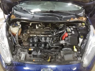 2016 Ford Fiesta SE z VIN 3FADP4BJ0GM112689, wystawiony jako IAAI lot #41231939 z przebiegiem 151 844 mil mil oraz . Historia ofert i sprzedaży dostępna na DreamBid. Obrazek 10.