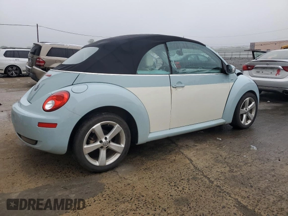 2010 Volkswagen Beetle with VIN 3VWRG3AL7AM006001, listed as a Copart auction lot 56973285 with Not provided miles and Salvage title. Bid and sale history available at DreamBid. Image 3.