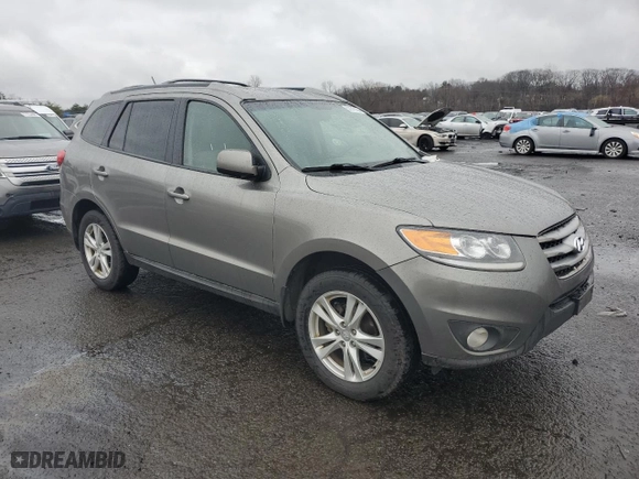 2012 Hyundai Santa Fe SE with VIN 5XYZHDAG5CG143723, listed as a Copart auction lot 52140165 with 321,243 mi miles and Clean Title. Bid and sale history available at carsss.com. Image 4.