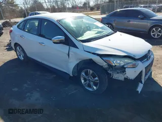 2014 Ford Focus SE with VIN 1FADP3F21EL119923, listed as a IAAI auction lot 41585170 with 126,266 mi miles. Bid and sale history available at carsss.com. Image 1.