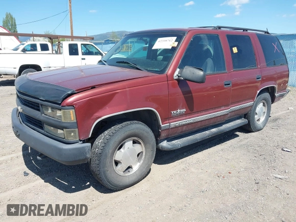 1999 Chevrolet Tahoe Z71 with VIN 1GNEK13R4XJ341736, listed as a IAAI auction lot 42218712 with 282,663 mi miles and . Bid and sale history available at DreamBid. Image 2.