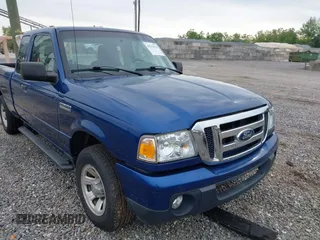 2011 Ford Ranger XLT with VIN 1FTKR4EE2BPA89719, listed as a IAAI auction lot 42212934 with 167,072 mi miles. Bid and sale history available at carsss.com. Image 1.