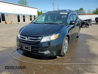 2014 Honda Odyssey Touring with VIN 5FNRL5H99EB088859, listed as a Copart auction lot 54828555 with 147,147 mi miles and Salvage Title. Bid and sale history available at DreamBid. Image 14.