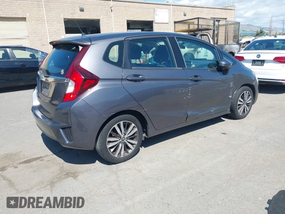 2015 Honda Fit EX-L z VIN 3HGGK5H86FM746265, wystawiony jako IAAI lot #42253205 z przebiegiem 75 491 mil mil oraz . Historia ofert i sprzedaży dostępna na DreamBid. Obrazek 4.