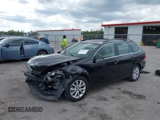 2013 Volkswagen Jetta SportWagen SE with VIN 3VWPX7AJ4DM655174, listed as a IAAI auction lot 42072632 with 65,899 mi miles. Bid and sale history available at carsss.com. Image 2.