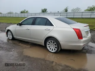 2014 Cadillac CTS Luxury RWD with VIN 1G6AR5S35E0170749, listed as a Copart auction lot 50735645 with 105,638 mi miles and Salvage Title. Bid and sale history available at DreamBid. Image 2.