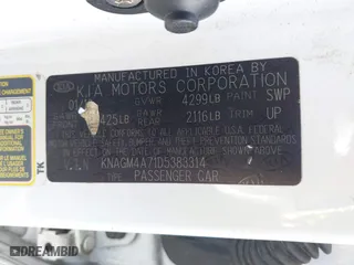 2013 Kia Optima LX with VIN KNAGM4A71D5383314, listed as a IAAI auction lot 41812942 with 228,220 mi miles. Bid and sale history available at carsss.com. Image 9.