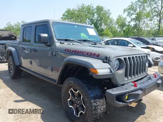 2021 Jeep Gladiator Rubicon with VIN 1C6JJTBG2ML515932, listed as a IAAI auction lot 42471704 with 57,775 mi miles and . Bid and sale history available at DreamBid. Image 1.