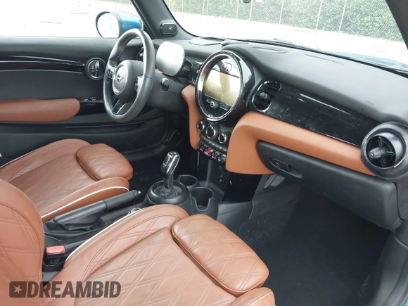 2022 MINI Convertible Cooper S z VIN WMW43DL06N3P19784, wystawiony jako IAAI lot #42635816 z przebiegiem 17 053 mil mil oraz . Historia ofert i sprzedaży dostępna na DreamBid. Obrazek 5.