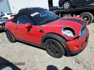 2012 MINI Roadster z VIN WMWSY1C59CT311571, wystawiony jako Copart lot #46381264 z przebiegiem 60 694 mil mil oraz Szkody całkowita. Historia ofert i sprzedaży dostępna na DreamBid. Obrazek 4.