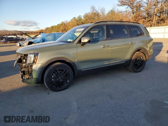 2023 Kia Telluride EX X-Line z VIN 5XYP3DGCXPG360992, wystawiony jako Copart lot #86904934 z przebiegiem 15 947 mil mil oraz Szkoda całkowita • Salvage title. Historia ofert i sprzedaży dostępna na DreamBid. Obrazek 1.