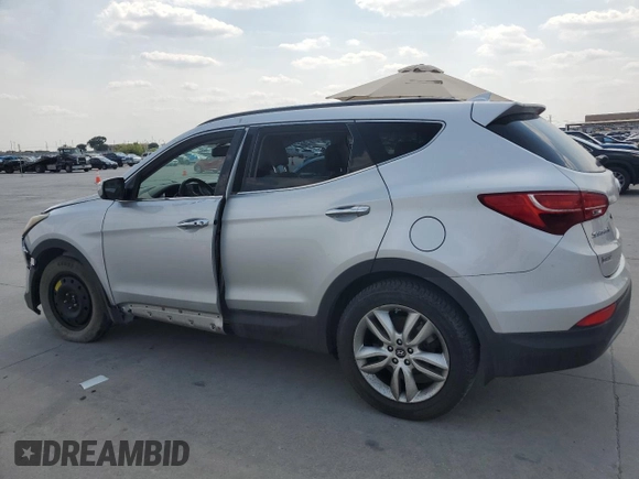 2013 Hyundai Santa Fe Sport z VIN 5XYZUDLA2DG069389, wystawiony jako Copart lot #64054684 z przebiegiem 162 861 mil mil oraz Szkoda całkowita • Salvage title. Historia ofert i sprzedaży dostępna na DreamBid. Obrazek 2.