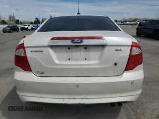 2012 Ford Fusion SEL z VIN 3FAHP0JAXCR282521, wystawiony jako Copart lot #53115505 z przebiegiem 96 833 mil mil oraz Szkoda całkowita • Salvage title. Historia ofert i sprzedaży dostępna na DreamBid. Obrazek 6.