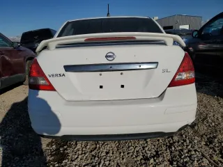 2007 Nissan Versa 1.8 SL with VIN 3N1BC11E57L414097, listed as a Copart auction lot 46945525 with 81,788 mi miles and Salvage Title. Bid and sale history available at carsss.com. Image 6.