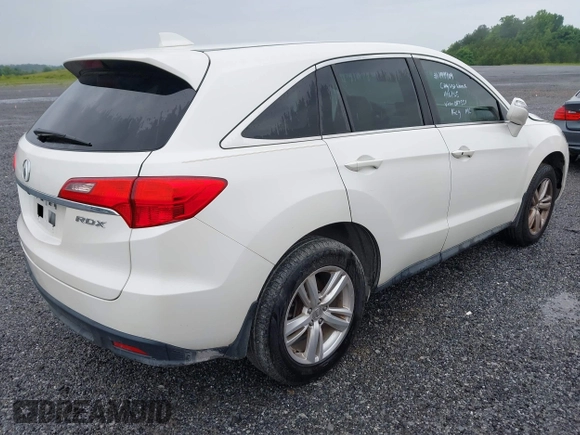 2013 Acura RDX Technology with VIN 5J8TB3H51DL017551, listed as a IAAI auction lot 41464240 with 122,863 mi miles and . Bid and sale history available at DreamBid. Image 4.