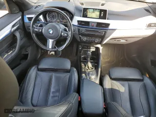 2016 BMW X1 xDrive28i with VIN WBXHT3C36G5E48019, listed as a Copart auction lot 51843235 with 95,711 mi miles and Salvage Title. Bid and sale history available at carsss.com. Image 8.
