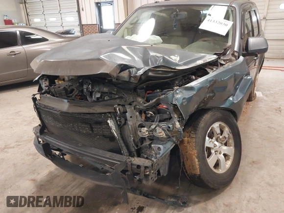 2010 Ford Escape Hybrid with VIN 1FMCU4K31AKC15842, listed as a IAAI auction lot 41332030 with 490,296 mi miles and . Bid and sale history available at DreamBid. Image 12.