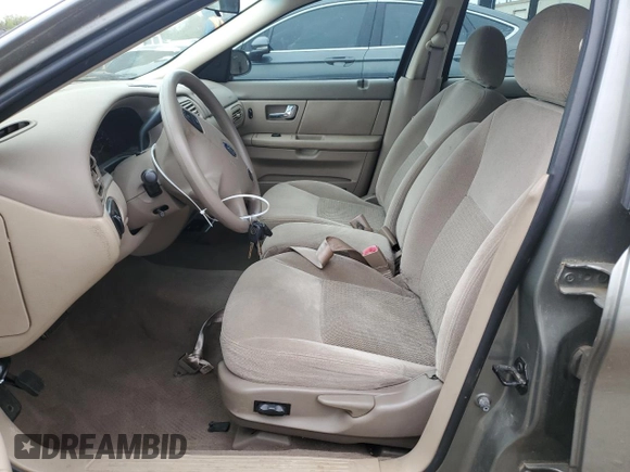 2003 Ford Taurus SES Standard with VIN 1FAFP552X3A178189, listed as a Copart auction lot 51162275 with 113,887 mi miles and Salvage Title. Bid and sale history available at carsss.com. Image 7.