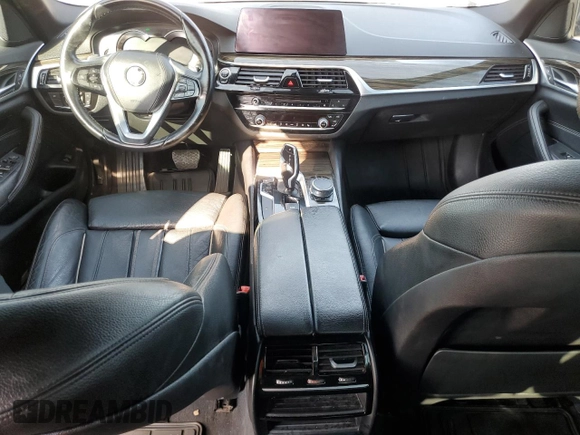 2018 BMW 5 Series 530i with VIN WBAJA5C54JG899845, listed as a Copart auction lot 76386124 with 57,379 mi miles and Salvage Title. Bid and sale history available at DreamBid. Image 8.