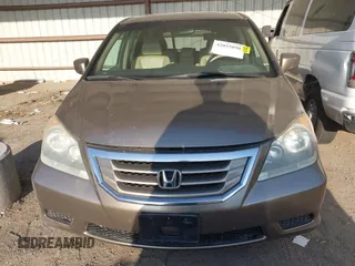 2010 Honda Odyssey EX-L with VIN 5FNRL3H79AB048049, listed as a IAAI auction lot 42055090 with 142,736 mi miles. Bid and sale history available at carsss.com. Image 12.