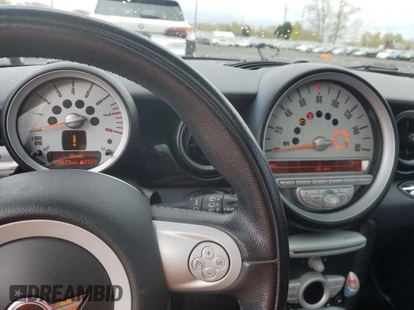 2009 MINI Hardtop with VIN WMWMF33509TU73771, listed as a Copart auction lot 51156025 with 119,622 mi miles and Salvage Title. Bid and sale history available at DreamBid. Image 9.