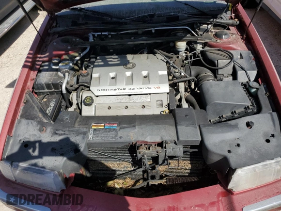 2000 Cadillac Eldorado z VIN 1G6EL12Y7YU198685, wystawiony jako Copart lot #75093094 z przebiegiem Nie podano mil oraz Szkoda całkowita • Salvage title. Historia ofert i sprzedaży dostępna na DreamBid. Obrazek 11.
