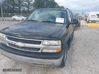 2004 Chevrolet Tahoe LT with VIN 1GNEC13Z74J314927, listed as a IAAI auction lot 41231288 with 195,809 mi miles. Bid and sale history available at carsss.com. Image 6.