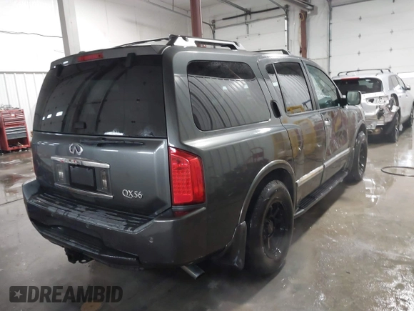 2004 Infiniti QX56 with VIN 5N3AA08C14N812225, listed as a IAAI auction lot 41496326 with 213,916 mi miles. Bid and sale history available at carsss.com. Image 4.
