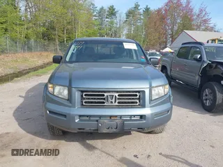2007 Honda Ridgeline RT z VIN 2HJYK16227H530001, wystawiony jako IAAI lot #42197799 z przebiegiem 259 077 mil mil oraz . Historia ofert i sprzedaży dostępna na DreamBid. Obrazek 13.