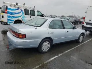 1994 Toyota Camry LE with VIN 4T1SK12E8RU411682, listed as a Copart auction lot 44153535 with 214,022 mi miles and Salvage Title. Bid and sale history available at carsss.com. Image 3.