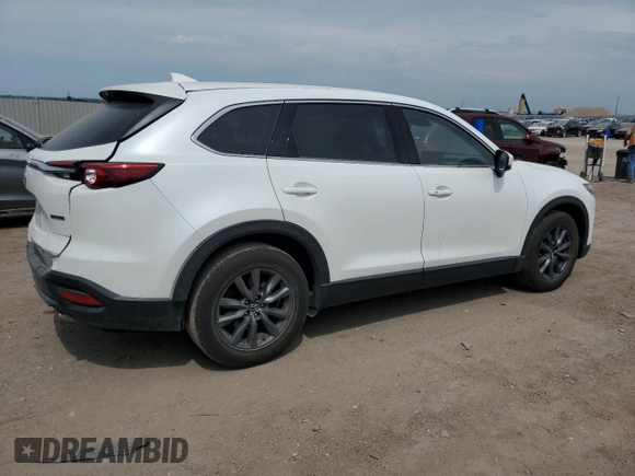 2021 Mazda CX-9 Touring with VIN JM3TCBCY4M0524573, listed as a Copart auction lot 60961165 with 58,408 mi miles and Salvage title. Bid and sale history available at DreamBid. Image 3.