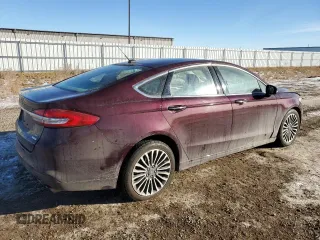 2017 Ford Fusion SE with VIN 3FA6P0HDXHR211897, listed as a Copart auction lot 83514654 with 128,914 mi miles and Salvage Title. Bid and sale history available at DreamBid. Image 3.