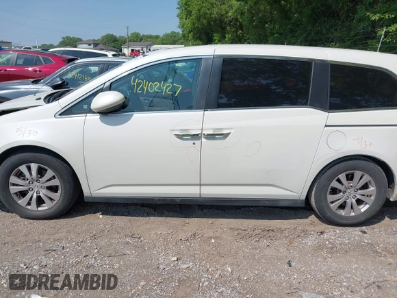 2014 Honda Odyssey EX-L with VIN 5FNRL5H63EB131596, listed as a IAAI auction lot 42402427 with 106,156 mi miles and . Bid and sale history available at DreamBid. Image 14.