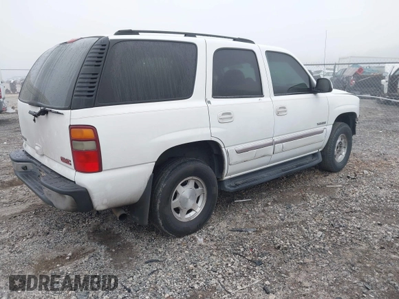 2003 GMC Yukon SLT with VIN 1GKEC13Z33R175358, listed as a IAAI auction lot 41801299 with 269,167 mi miles. Bid and sale history available at carsss.com. Image 4.