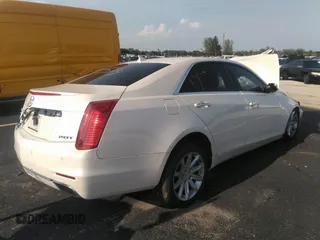 2014 Cadillac CTS RWD z VIN 1G6AP5SXXE0180377, wystawiony jako IAAI lot #41940004 z przebiegiem 87 419 mil mil oraz . Historia ofert i sprzedaży dostępna na DreamBid. Obrazek 4.