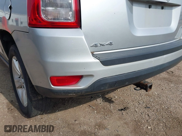 2013 Jeep Compass Sport with VIN 1C4NJDBB4DD119077, listed as a IAAI auction lot 42142532 with 131,679 mi miles. Bid and sale history available at carsss.com. Image 6.