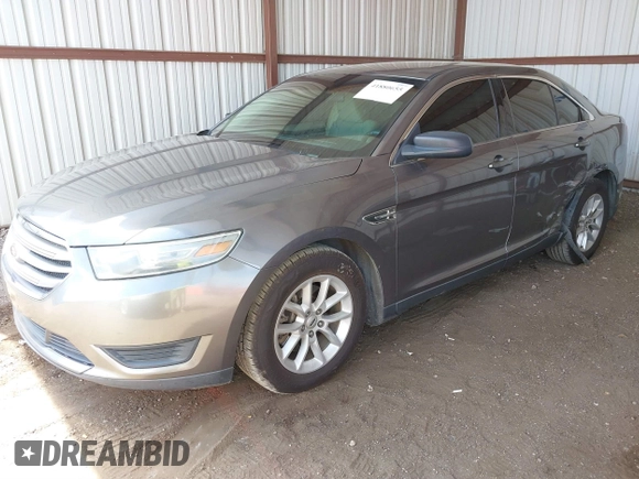 2014 Ford Taurus SE with VIN 1FAHP2D89EG136335, listed as a IAAI auction lot 41880655 with 211,635 mi miles. Bid and sale history available at carsss.com. Image 2.