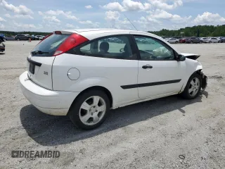 2003 Ford Focus ZX3 with VIN 3FAFP31383R117755, listed as a Copart auction lot 60668725 with 135,856 mi miles and Salvage title. Bid and sale history available at DreamBid. Image 3.